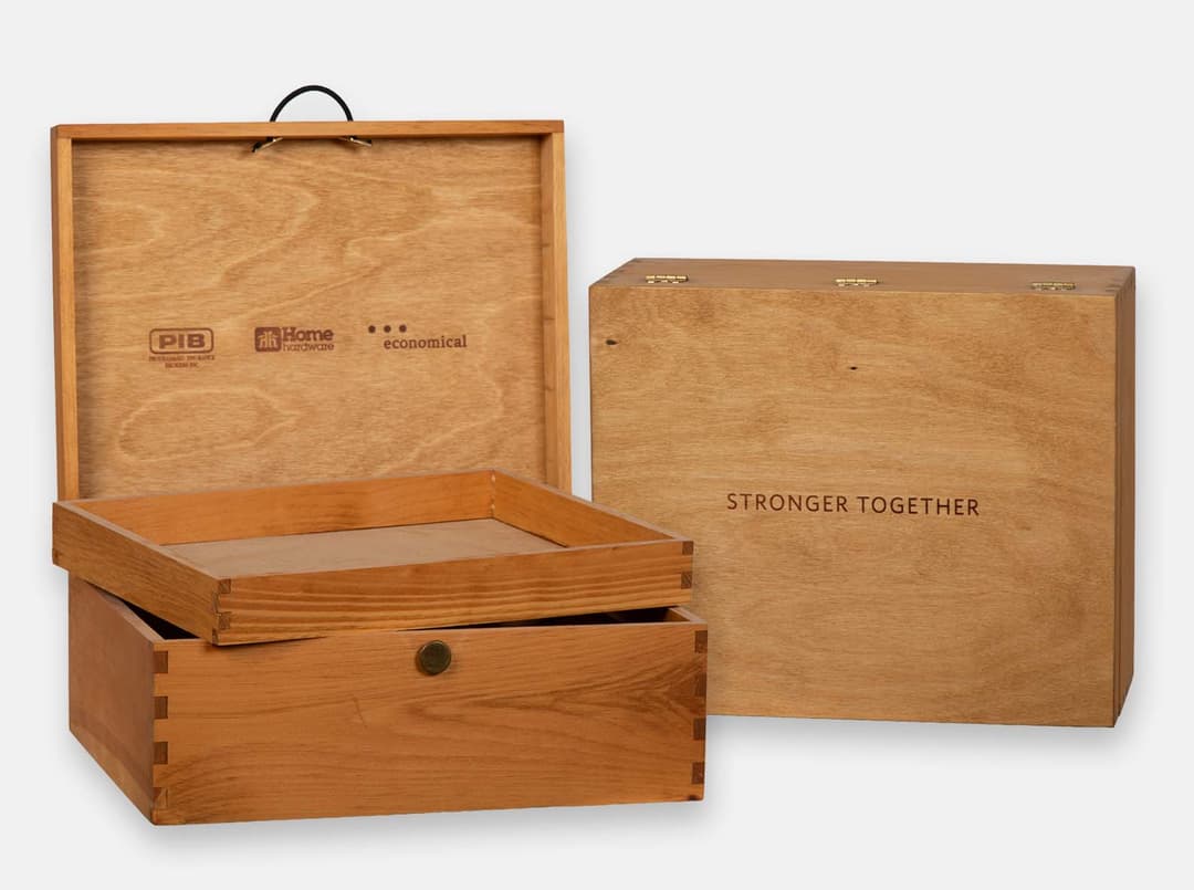 Custom pine hinged presentation case for One & Only resort. Wood imprint branding on outside and inside of lid. Box joint construction. Hand-rubbed Antique pine oil finish. Custom yokes for flutes.