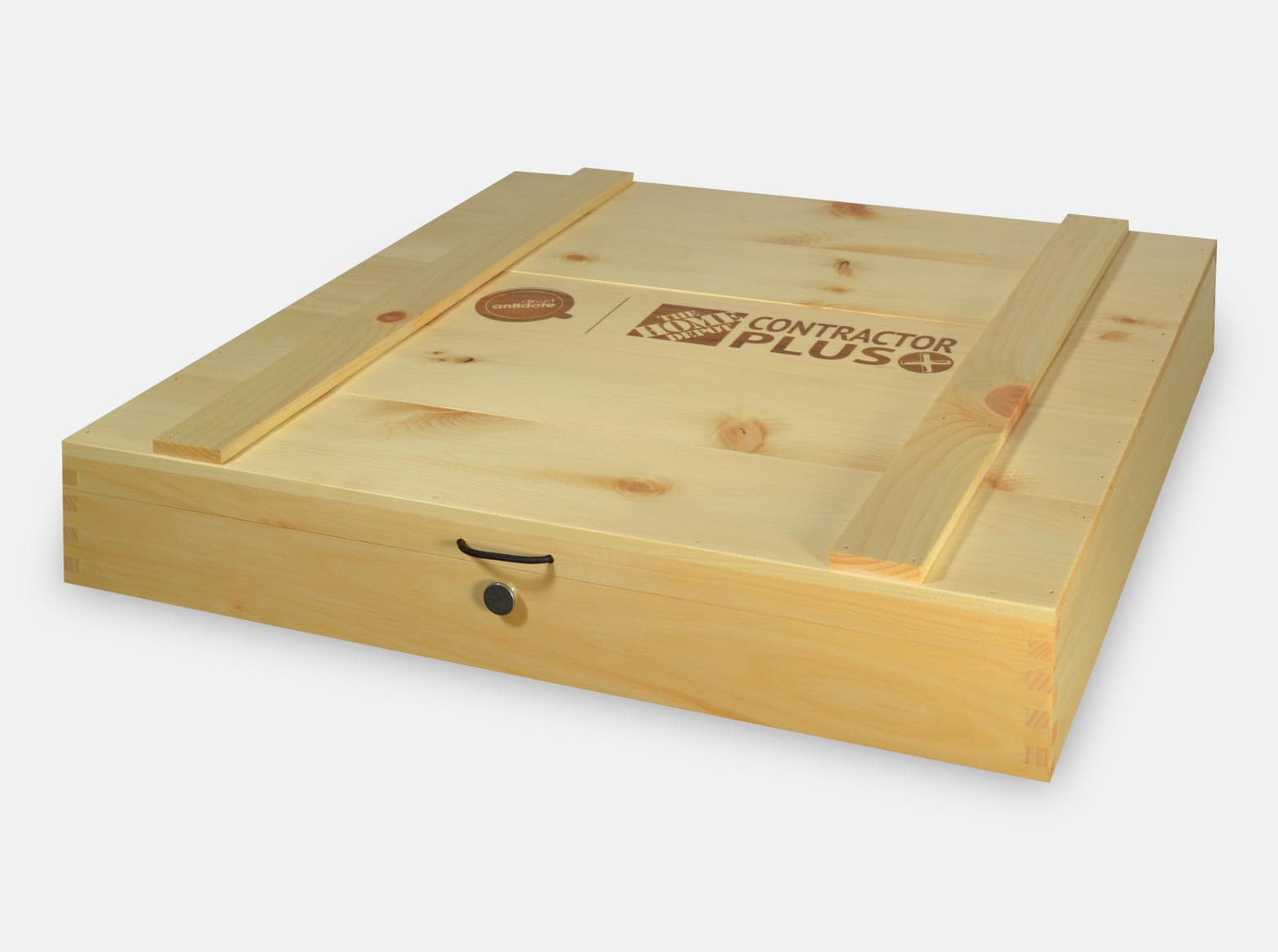 Hinged wooden presentation box with a pewter button closure, made for Home Depot.