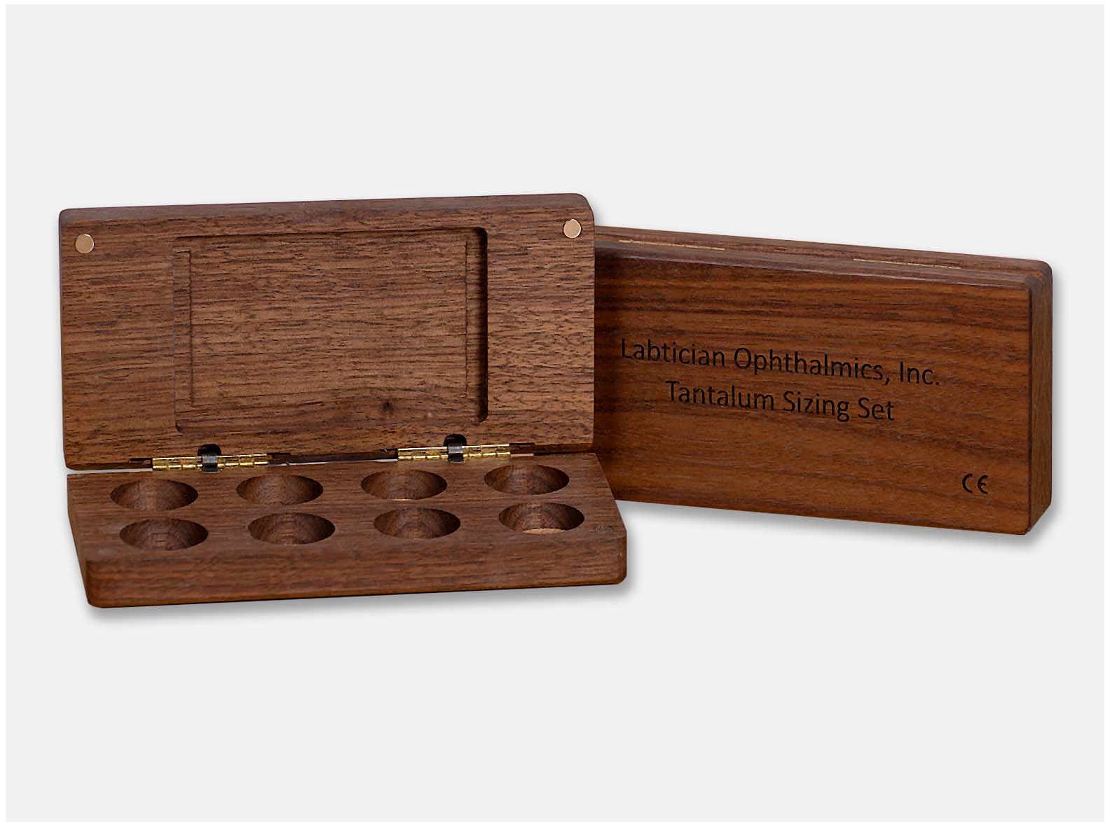 Black walnut wooden presentation box with a cork inlay and magnetic closure