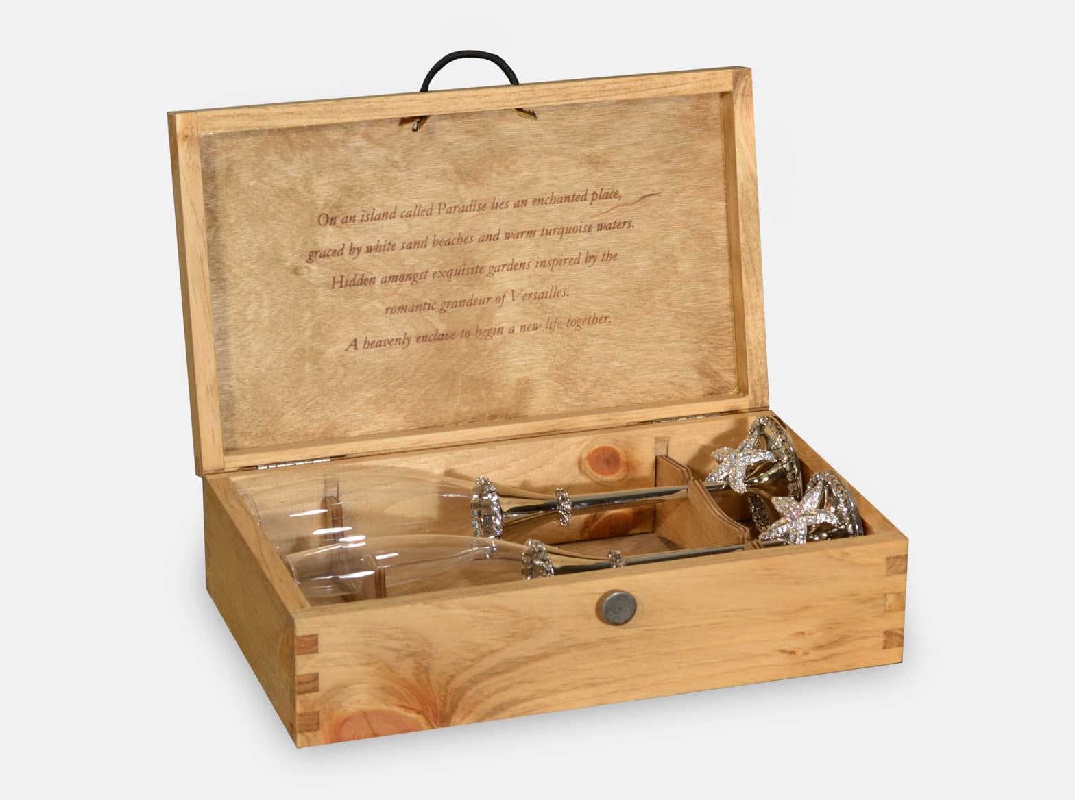 Hinged wooden gift box with custom yokes for two champagne glasses, made for a wedding suite.