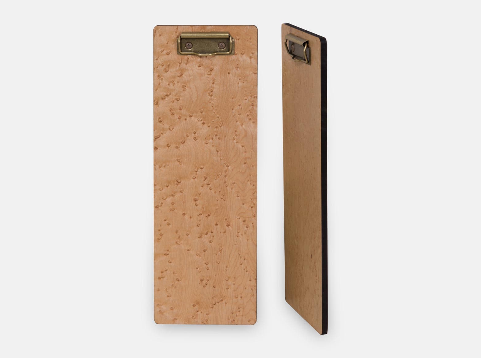 Birdseye maple menu clipboard with a brass clip.