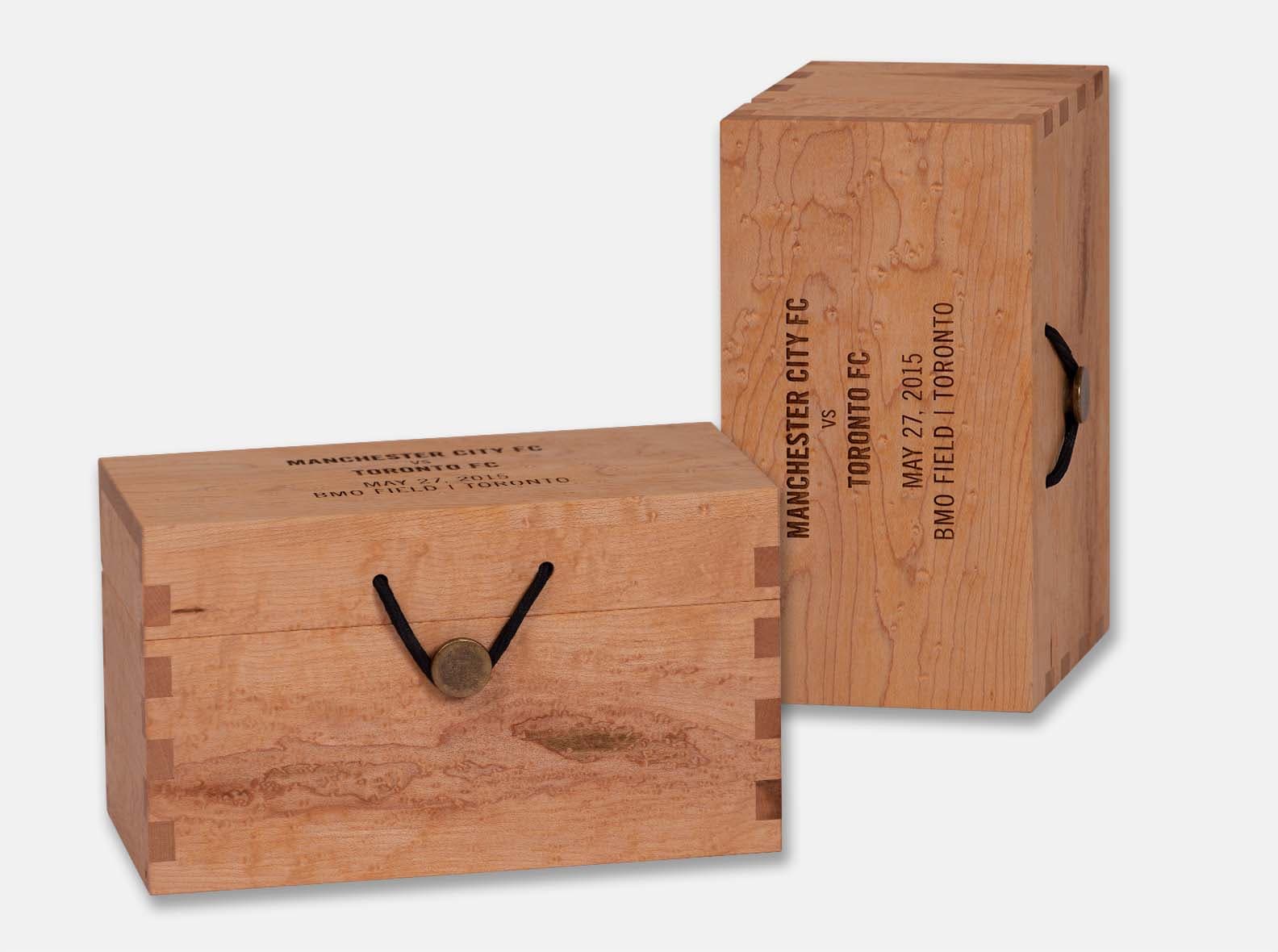 Wooden gift box with a pewter button closure