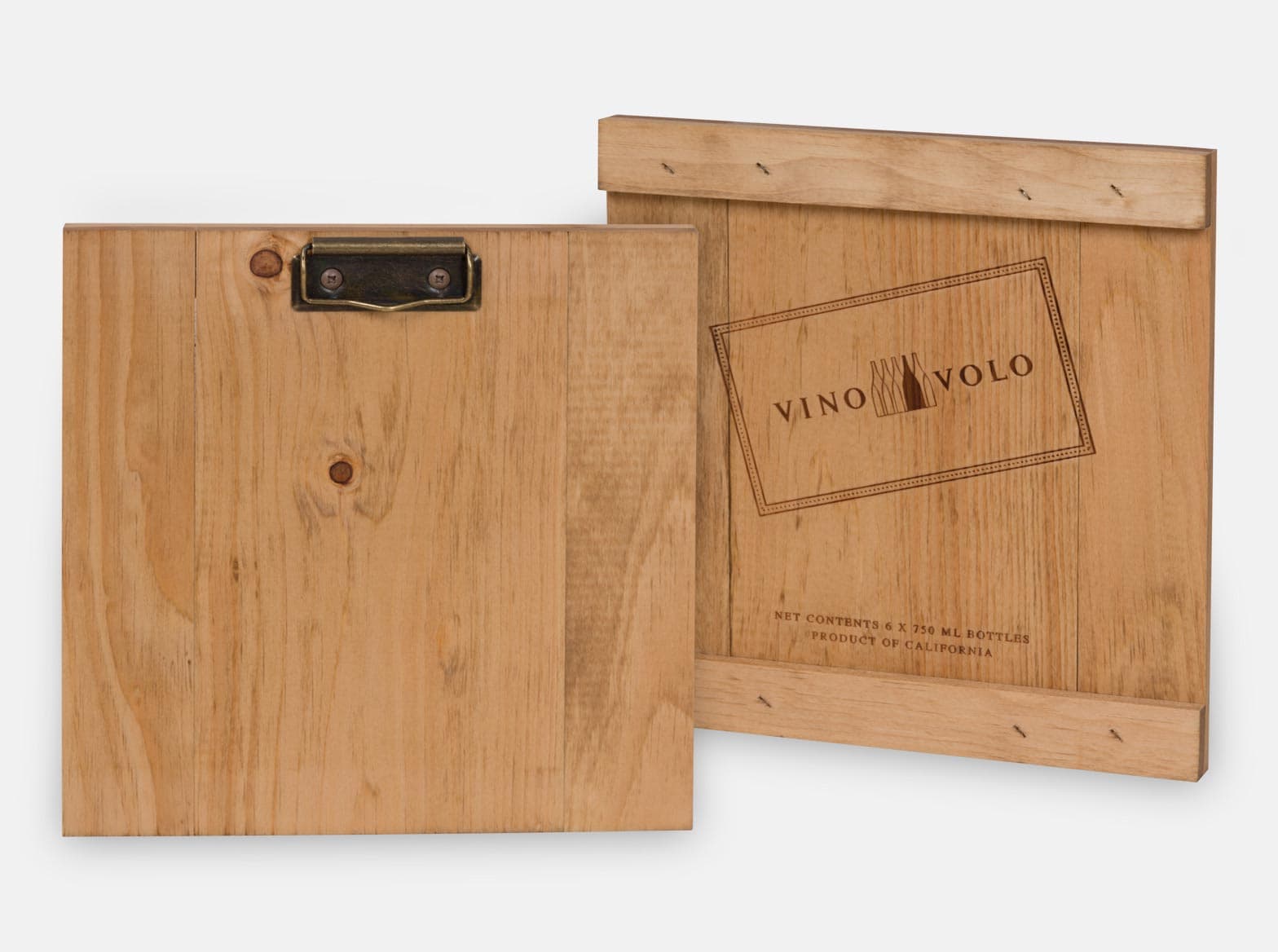 Wooden restaurant menu board with a brass clip, made to resemble a wine shipper lid.