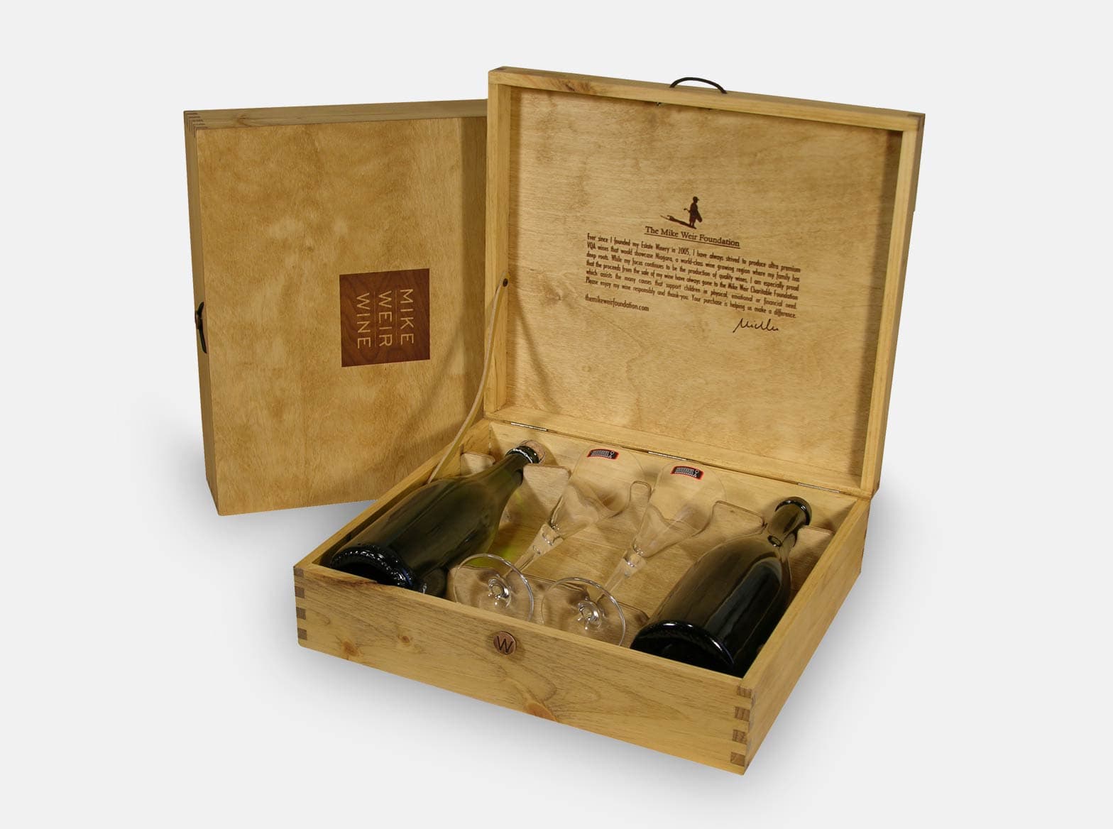 Hinged wooden gift box with custom yokes for two wine bottles and two glasses.