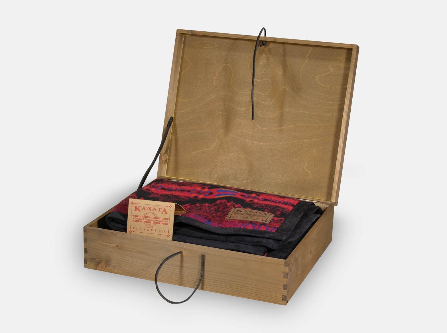 Hinged wooden presentation case with a black leather stay, made for Kanata Blanket.