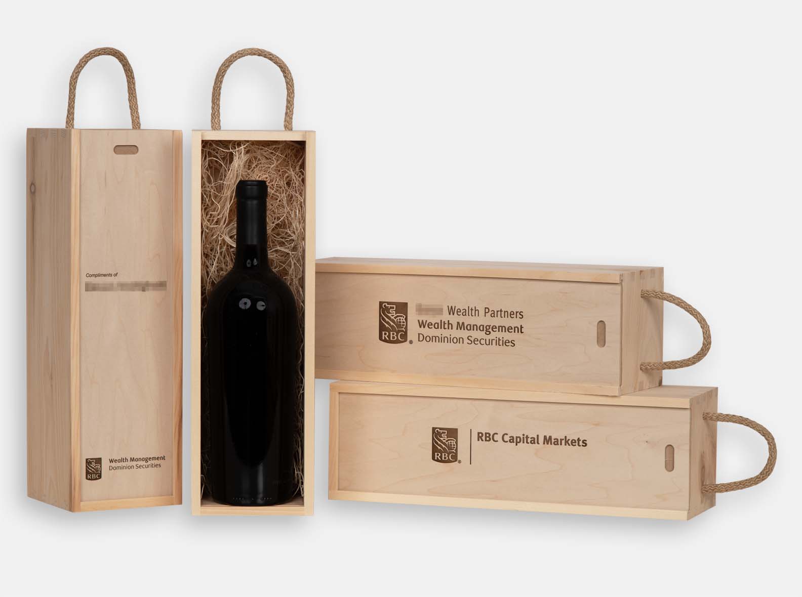 Wooden gift boxes with jute handles for RBC Wealth Management.