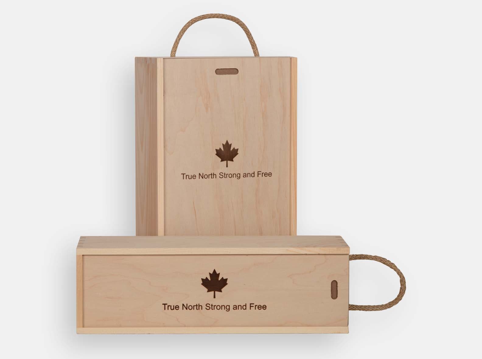 Single and two-bottle wooden wine gift boxes engraved "True North Strong and Free".