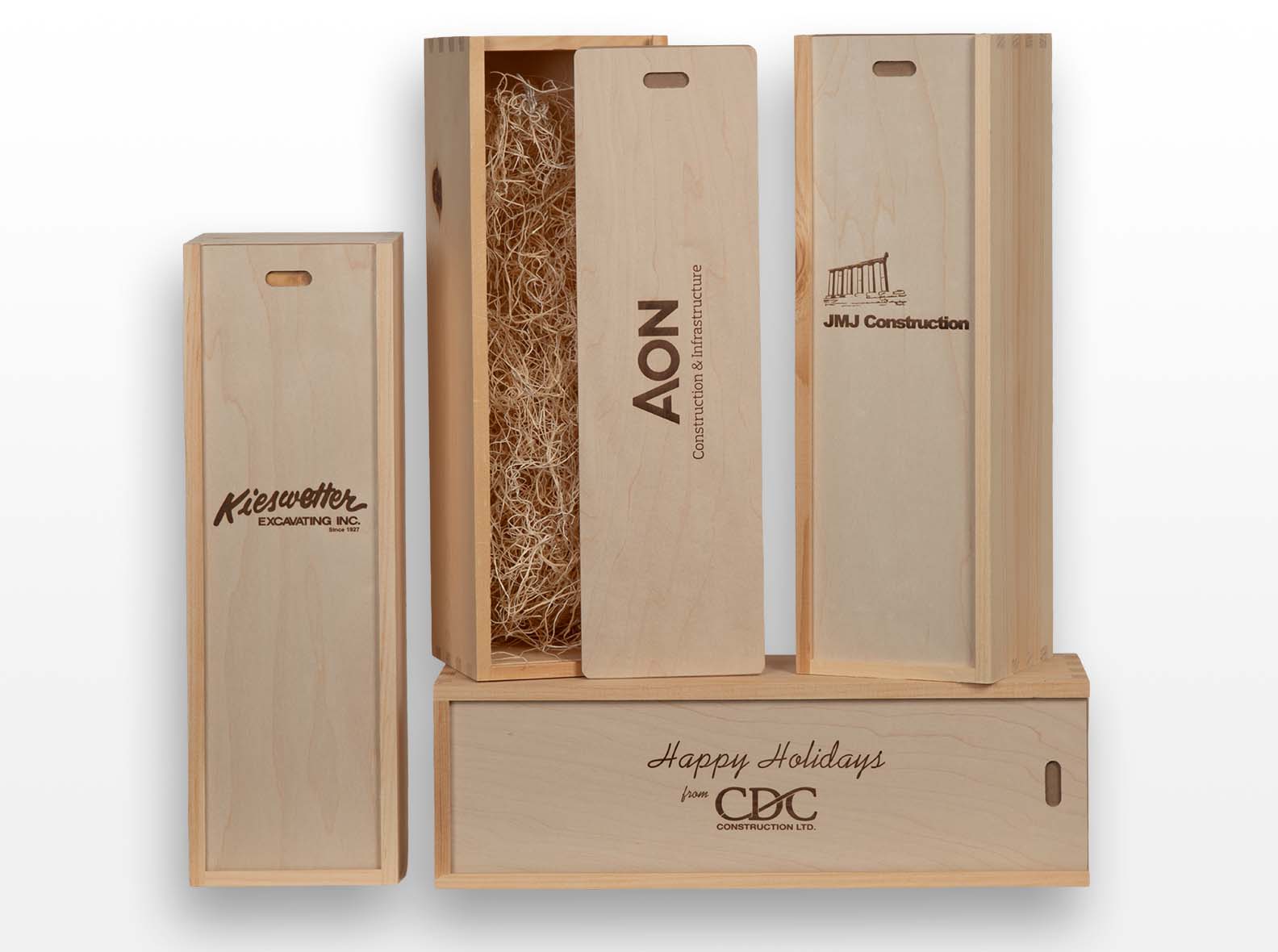 Engraved wooden gift box with a sliding lid, made for client appreciation gifting.