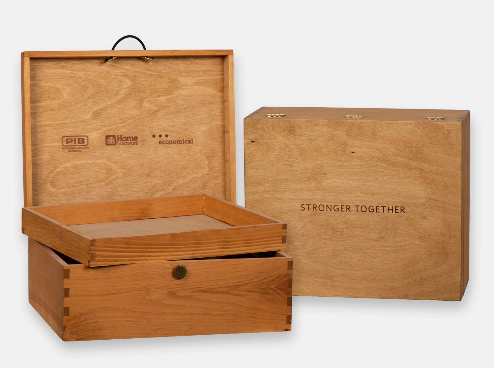 Hinged wooden presentation box with inset tray.