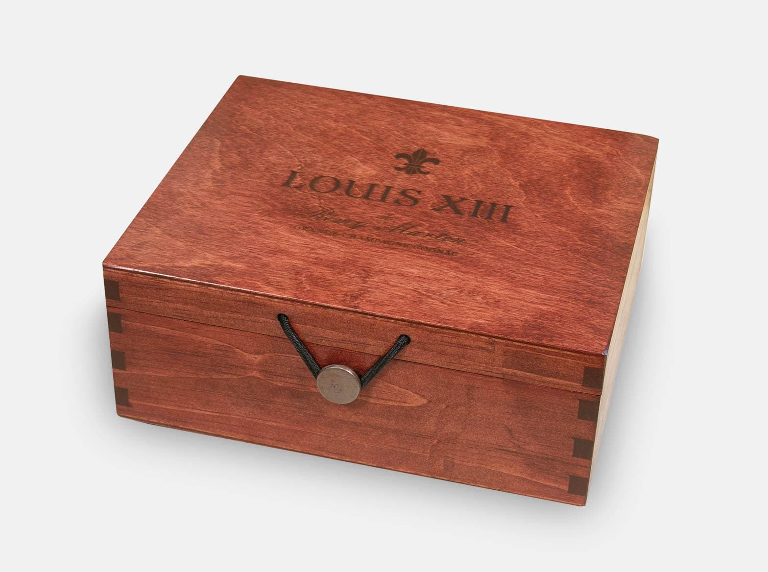 Wood hinged box with branding on the lid.
