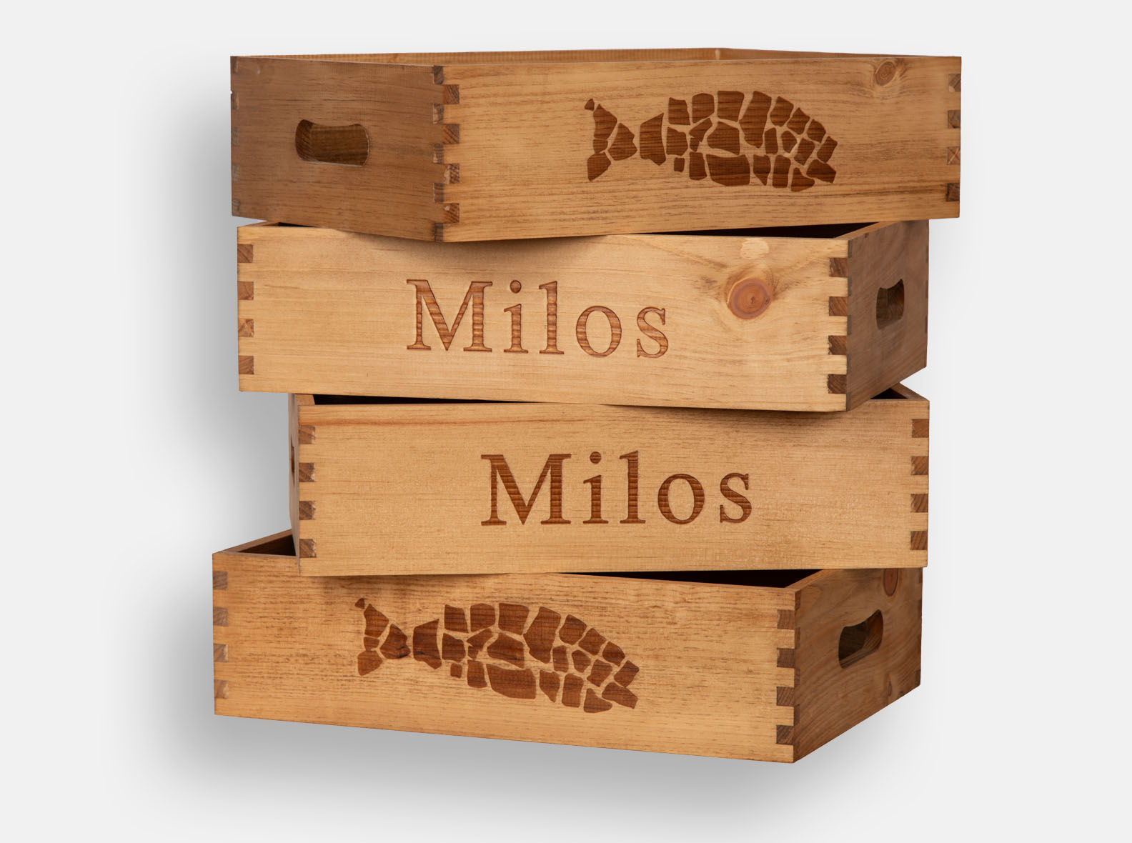 Wooden display crates with logo branding, made for fine-dining restaurant estiatorio Milos.