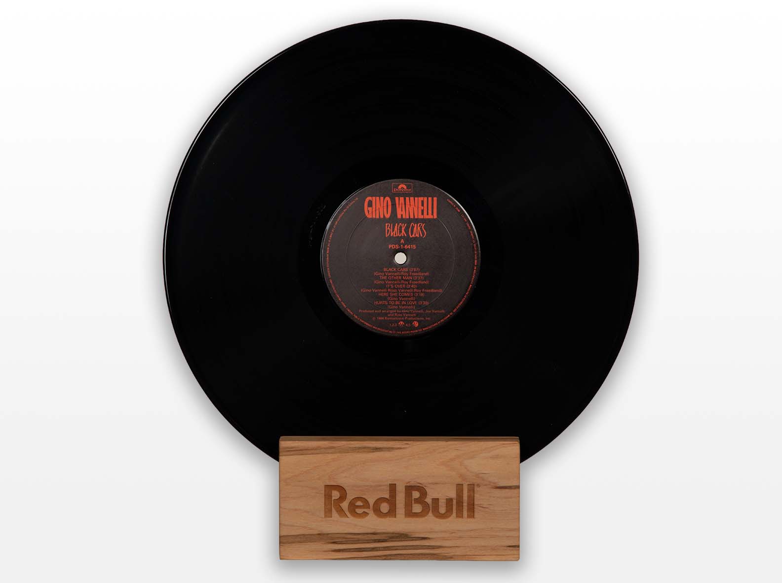 Red Bull Record Holder display base made from maple with a curved groove.