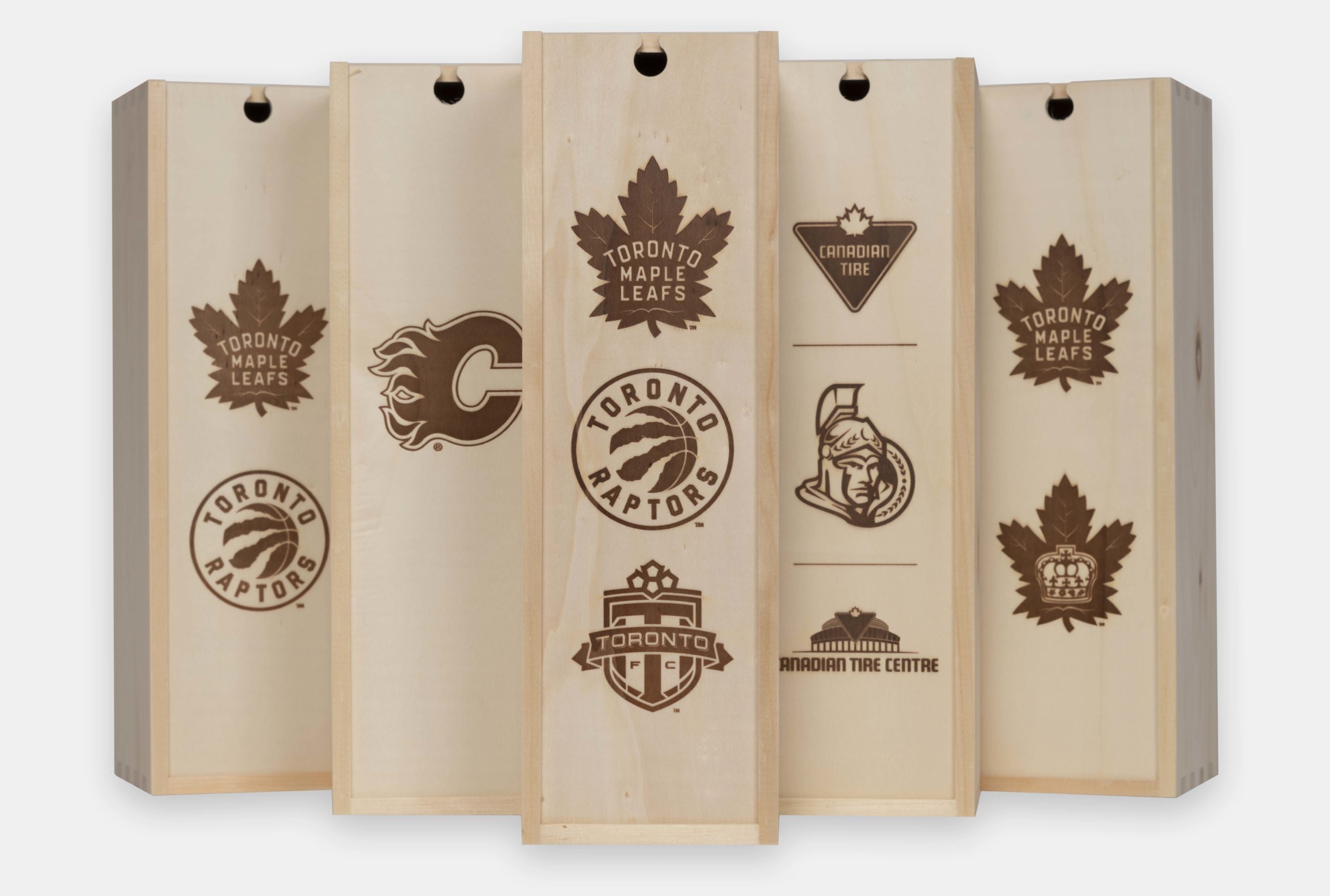 Sports team logo branded onto a wood box